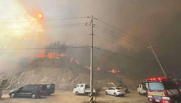 A wildfire destroys houses in Uljin.
