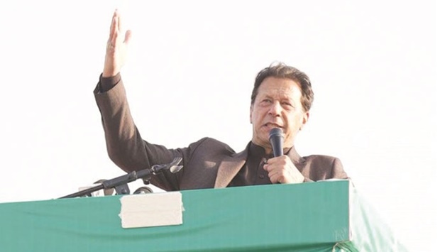 Prime Minister Imran Khan addressing a public meeting in Mailsi yesterday.