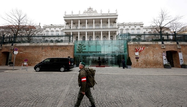 A member of the Austrian armed forces walks past Palais Coburg, the site of a meeting of the Joint Comprehensive Plan of Action (JCPOA), in Vienna, Austria, on February 8. REUTERS