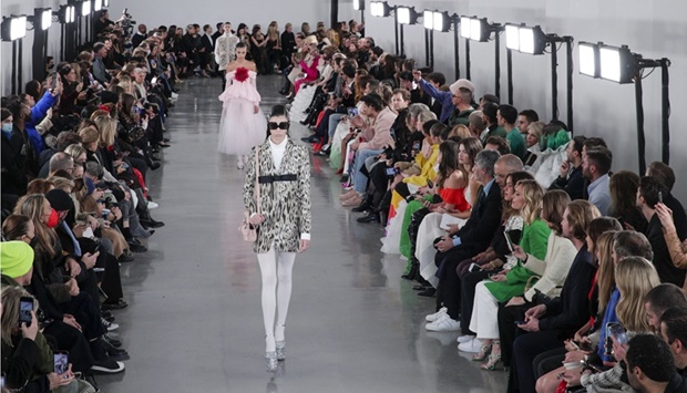 A model presents a creation by Giambattista Valli during the Women's Fall-Winter 2022-2023 Ready-to-Wear collection fashion show in Paris, on March 7, 2022.