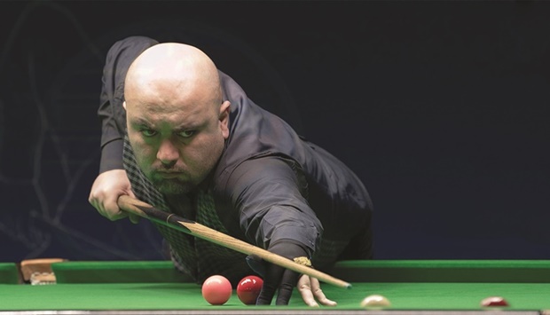 Amir Sarkhosh in action during the IBSF World Snooker Championships at the Qatar Billiards and Snooker Federation hall on Monday.