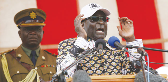 Zimbabweu2019s President Robert Mugabe speaks at a Zanu PF election rally west of Harare.