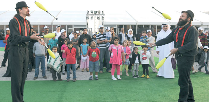 Jugglers performing at a promotion event for National Sport Day.