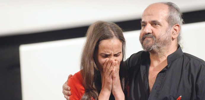 Wiam Simav Bedirxan and Ossama Mohamed react before the screening of Silvered Water, Syria Self-Portrait in Cannes on Friday.
