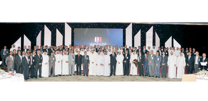 Qatar Steel officials, dignitaries, traders and distributors at the event.