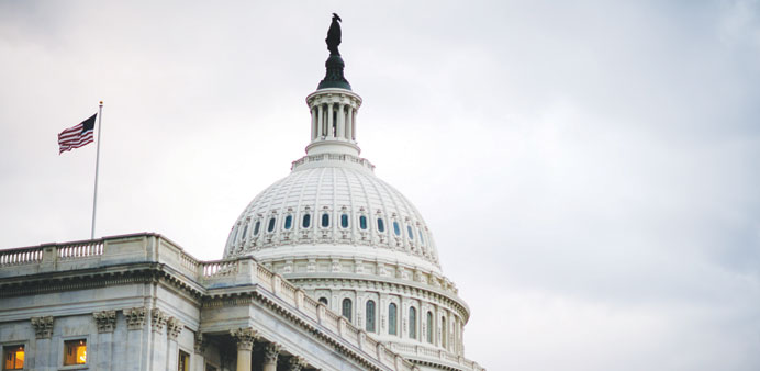 American flags fly outside the US Capitol in Washington, DC. With the eurozone already dragged down by a recession, a slowing of economic activity in 