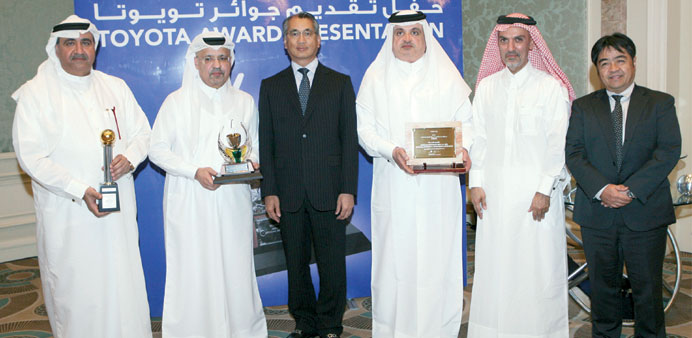 Abdullah Abdulghani & Bros and Toyota Motor Corporation officials at the awards ceremony.