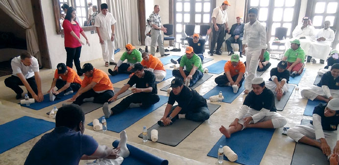  BBQ members participate in exercises during the yoga session.