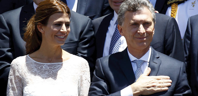 Macri and his wife Juliana Awada leave the Congress building after he was sworn in as president.