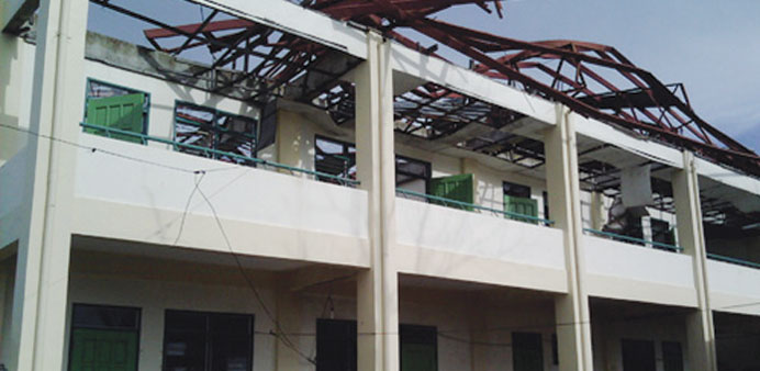 The roof of the San Jose School, which was damaged during typhoon Haiyan, is yet to be repaired.