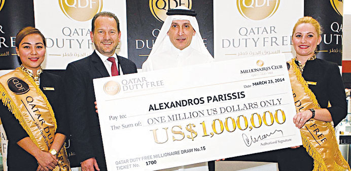 Akbar al-Baker and Qatar Duty Free senior vice-president Keith Hunter announcing the winner of the 15th Millionaire draw.