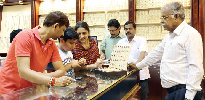 An Indian family shopping for jewellery in Doha yesterday.   PICTURE: Jayan Orma