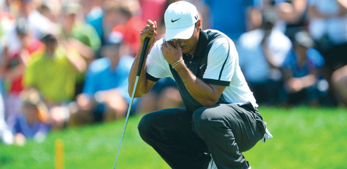 Tiger Woods waits on the sixth green during the third round of the PGA Championship yesterday. (AFP)