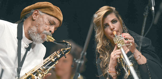 Cheo Jeffery Allen Solder on the saxophone and Eliana Burki on the alphorn.