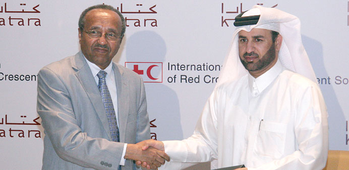 Al-Sulaiti with Geleta after signing the partnership agreement.
