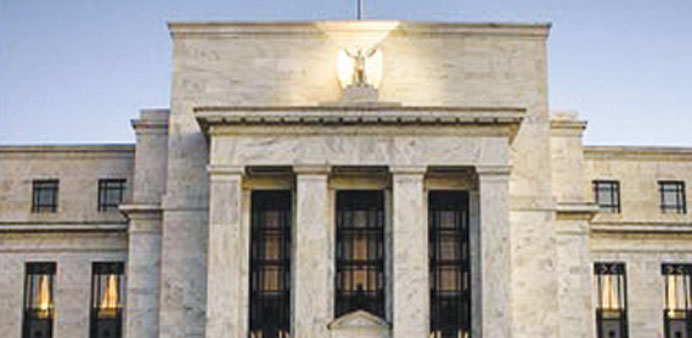 The US Federal Reserve is considering jettisoning a plan to eventually sell off the massive haul of bonds it is now buying,