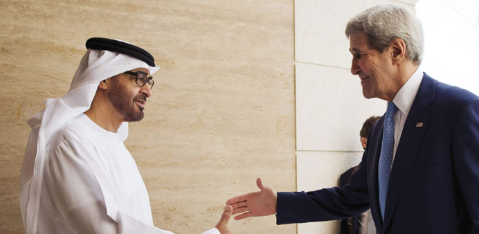 US Secretary of State John Kerry is greeted by Abu Dhabi Crown Prince Mohamed bin Zayed al-Nahyan at the Mina Palace in Abu Dhabi yesterday.