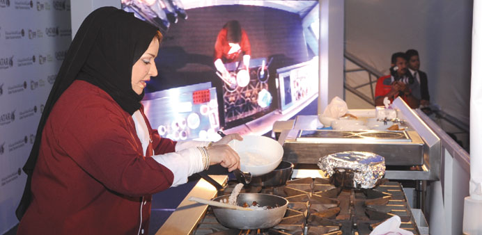  A chef preparing a dish at QIFF
