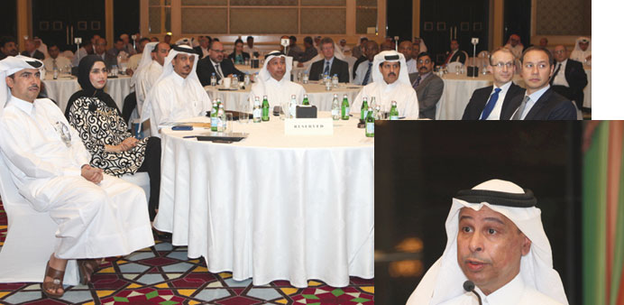    Participants at the first ERM Forum at The Ritz-Carlton Doha.  Issa Shahin al-Ghanim speaking at the forum.