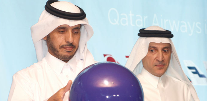 HE the Prime Minister Sheikh Abdullah bin Nasser bin Khalifa al-Thani inaugurating Qatar Airwaysu2019 joining of the oneworld alliance as CEO Akbar al-Bak