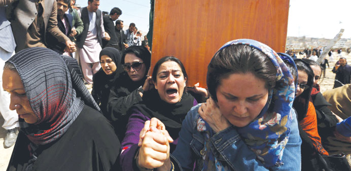 Afghan womenu2019s rights activists carry the coffin of Farkhunda, an Afghan woman who was beaten to death and set alight on fire on Thursday, during her 