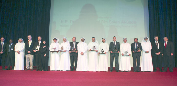 The winners with HE Dr al-Sada and the panel of judges.