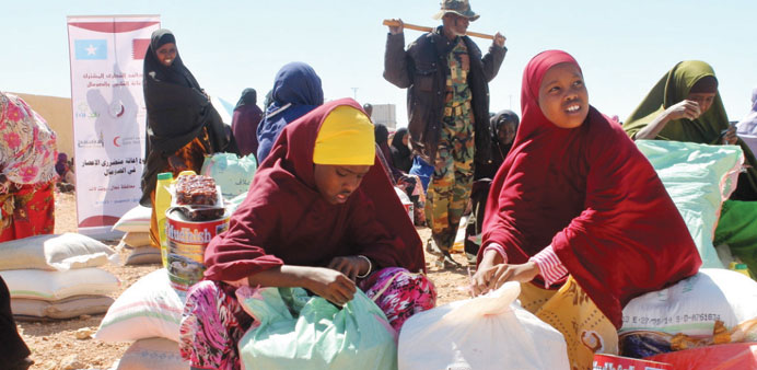 Somalian families receiving food items.