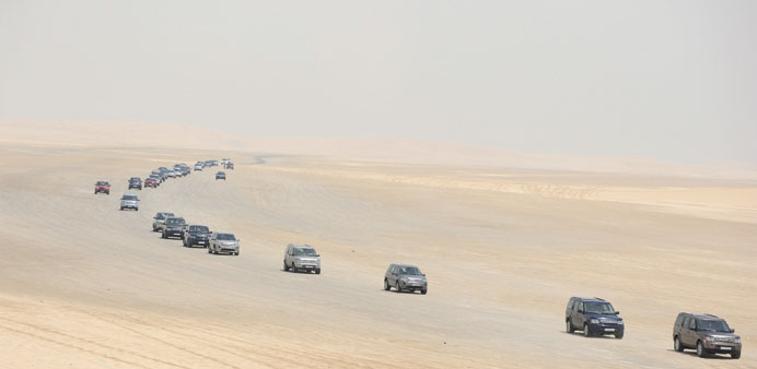 A long line of Land Rovers during the event.