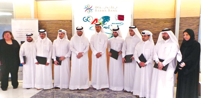 The Barwa Bank management team after receiving the award.
