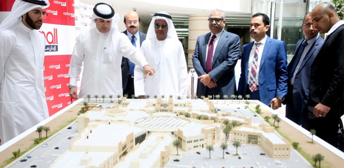 Ezdan Holding Group Deputy CEO Nasser al-Abdulla points to a scale model of the Al Wukair Shopping Centre. PICTURE: Naser TK.