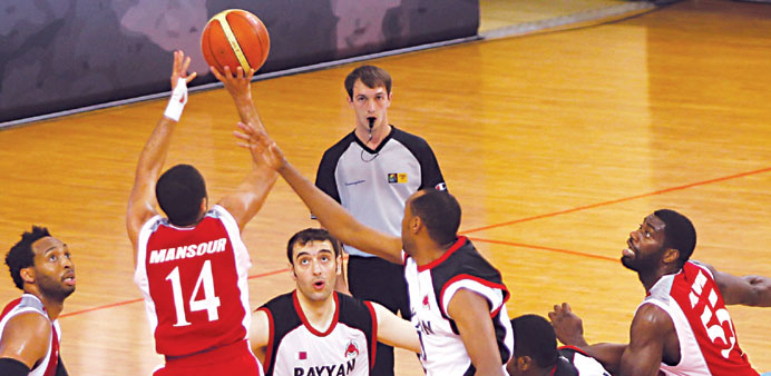 Al Rayyan and Al Arabi players in action during their Heir Apparent Cup basketball match on Tuesday.