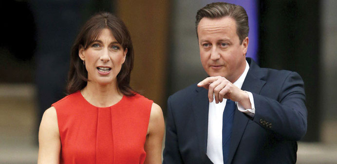 Prime Minister David Cameron and wife Samantha arrive at the annual Conservative Party Conference in Manchester yesterday.