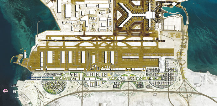 An illustration of the Hamad International Airport and Qataru2019s proposed Airport City (depicted by the four circles towards the base of the image).