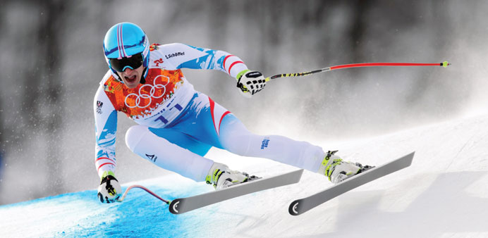 Austriau2019s Matthias Mayer competes during the Menu2019s Alpine Skiing Downhill at the Rosa Khutor Alpine Center during the Sochi Winter Olympics yesterday.