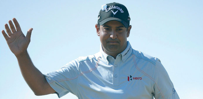 Shiv Kapur of India celebrates after making a birdie putt during the first round of the British Open Golf Championship at Muirfield in Scotland yester