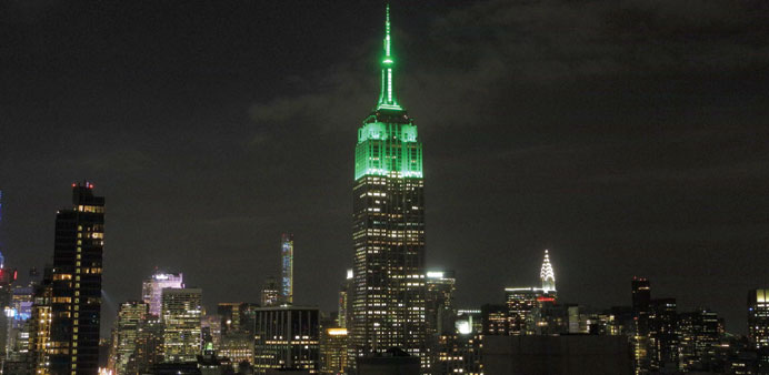 The Empire State Building is lit in green on Friday night in New York City to celebrate Eid al-Fitr.