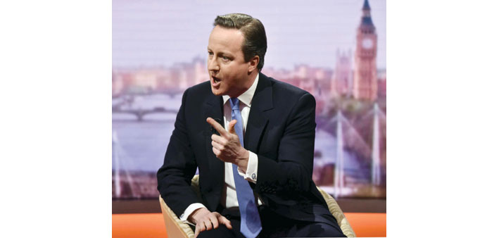  Prime Minister David Cameron gestures during an interview on The Andrew Marr Show in London yesterday.