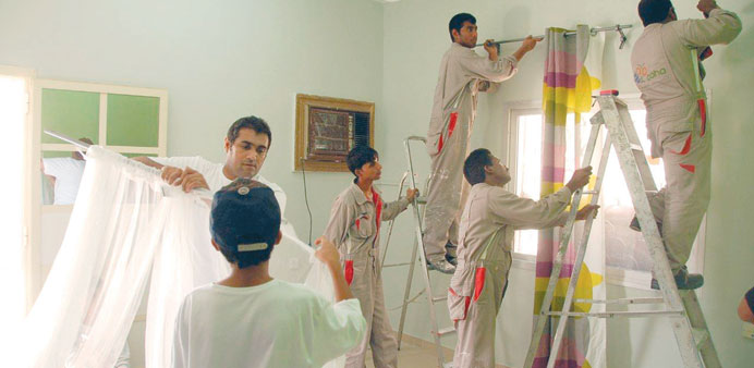 Rota volunteers taking part in house renovation.
