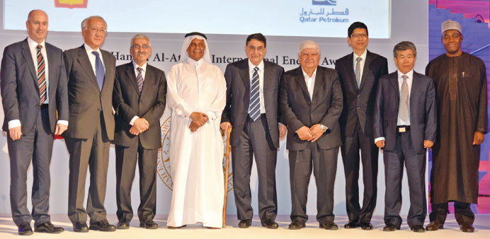 The award winners pose for a group photograph with HE Abdullah bin Hamad al-Attiyah. 