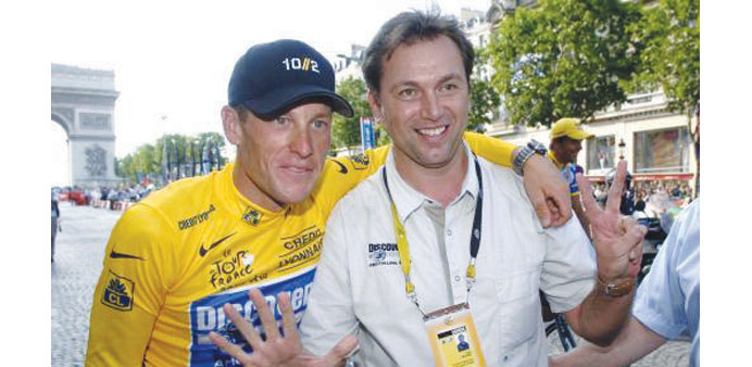 Lance Armstrong (left) and former team manager Johan Bruyneel.