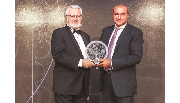 QIB Group CEO Bassel Gamal receives the u2018Top CEO Awardu2019.