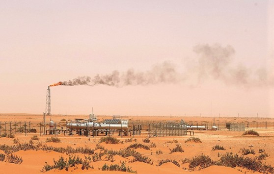 The picture taken on June 23, 2008 shows a flame from a Saudi Aramco oil facility known as u201cPump 3u201d in the desert near the oil-rich area of Khouris, 160kms east of Riyadh. The worldu2019s largest crude exporter and Sabic, the second biggest petrochemical maker in the world, are planning to build the refinery in Yanbu on the Red Sea coast of Saudi Arabia, according to two people with knowledge of the talks.