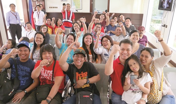 ENTHUSIASTIC: The Filipino expats who showed up on Saturday morning to vote.   Photos by Jayan Orma