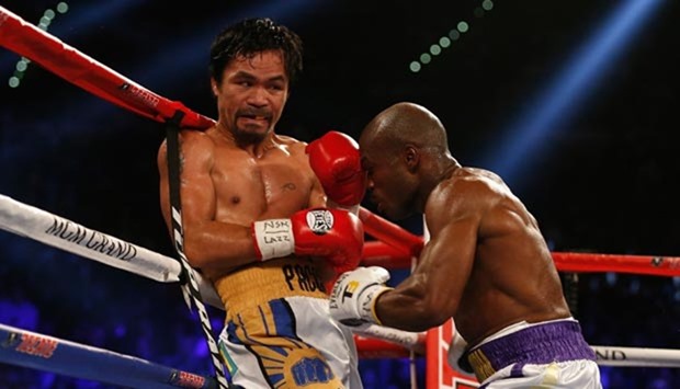Timothy Bradley (right) punches Manny Pacquiao during their welterweight championship fight at MGM Grand Garden Arena in Las Vegas.