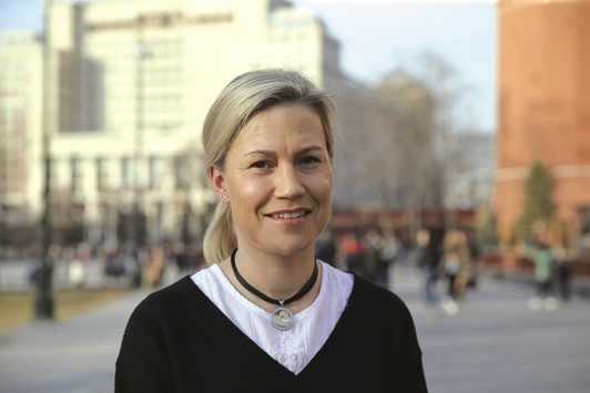 Anna Vaananen, head of Credit Suisseu2019s $60mn Russian Equity Fund, poses for a picture by the Kremlin wall in central Moscow. Despite the economic slowdown, Russia is still spending in areas that will drive consumption and so create opportunities for minority investors, says Vaananen.