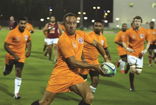 Qatar national rugby XVs squad take part in a training session on Sunday night.