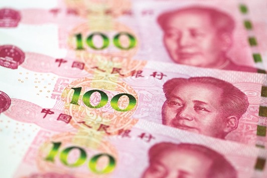Chinau2019s central bankers guided the yuan to a second straight monthly gain versus the dollar in March, while allowing it to drop to a 16-month low against a trade-weighted currency basket.