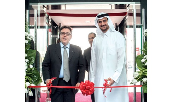 Stefano Zenti and AbdulSalam Issa Abu Issa formally inaugurating Canon Office Imaging Solutions (Doha) yesterday.