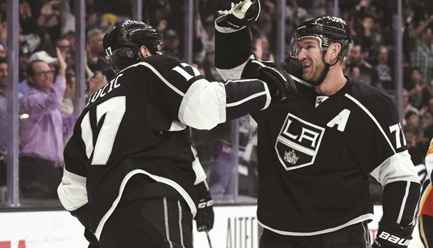 Los Angeles Kings center Jeff Carter (R) celebrates with left wing Milan Lucic after scoring his second goal against the Calgary Flames in the second period at Staples Center. PICTURE: USA TODAY Sports
