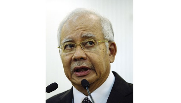 Najib: facing calls to quit.